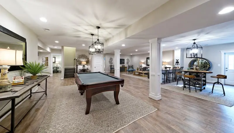 pool table in a games room of a finished basement