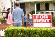 Zonda Urban National Rental Report - a family entering a home with a "for rent" sign out front