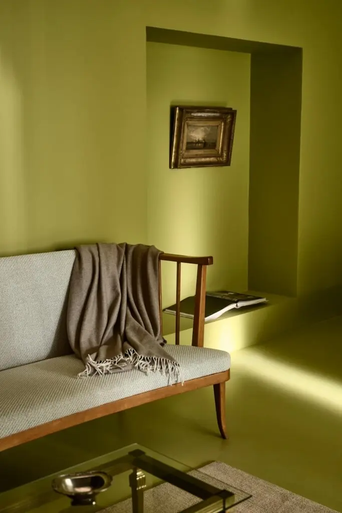 PPG Paint Color of the Year 2026, Secret Safari is a lime green, shown here in a foyer
